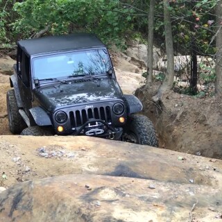 Brian-taking-on-the-top-of-trail-15-at-Wind-Rock-Offroad-Park-238317068